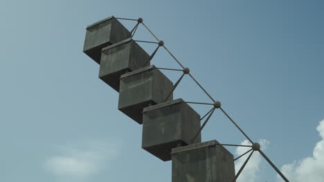 Tilting-Up-and-Down-Sculpture-Bou-Santiago-Calatrava,-Palma-de-Mallorca,-Sunny-Day