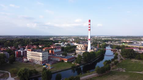 AERIAL-Approaching-Shot-of-a-Soviet-Thermal-Power-Plant-in-Klaipeda,-Lithuania