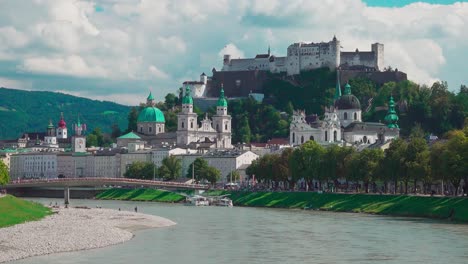 View-from-Müllnersteg-bridge-over-Salzach-river-towards-the-old-town-with-Fortress-Hohensalzburg-in-the-background