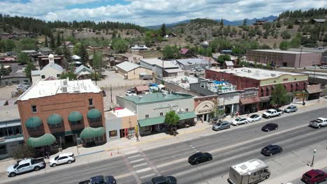 Aerial-View-of-Downtown-Pagosa-Springs,-Colorado-USA,-Main-Street-Traffic-and-Buildings,-Drone-Shot