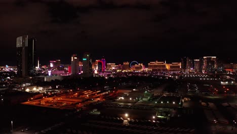Wide-panning-aerial-shot-of-the-central-Las-Vegas-Strip-at-night