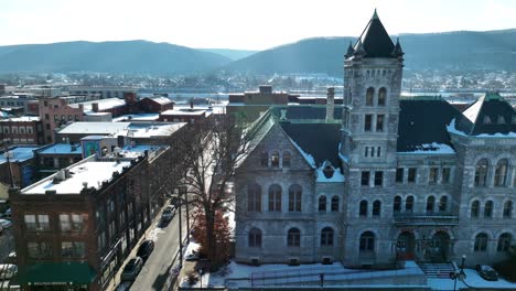 Aerial-truck-shot-of-tall,-gothic-building-in-Williamsport-PA