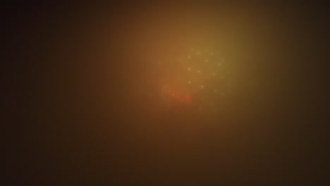 Close-up-of-fireworks-in-the-foggy-night-sky