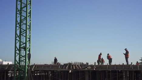 Mobile-Crane-lifting-a-wooden-pallet-of-concrete-bags-in-Casablanca-Morocco