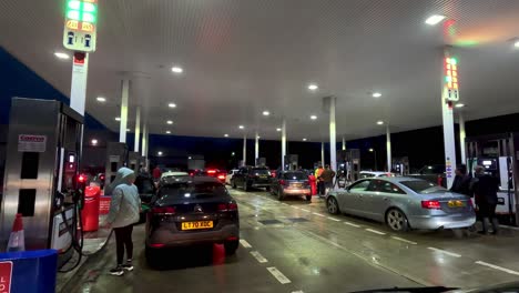 14-January-2023---Drivers-Filling-Up-At-Costco-Petrol-Station-In-Watford-At-Night
