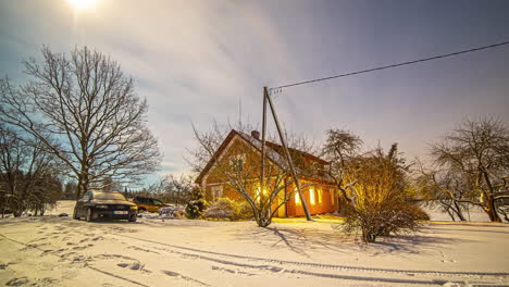 Front-view-or-facade-of-a-wooden-house-in-winter,-a-home-in-rural-area
