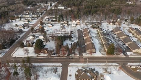 Aerial,-empty-streets-of-a-rural-suburban-town-during-winter,-COVID-19-pandemic