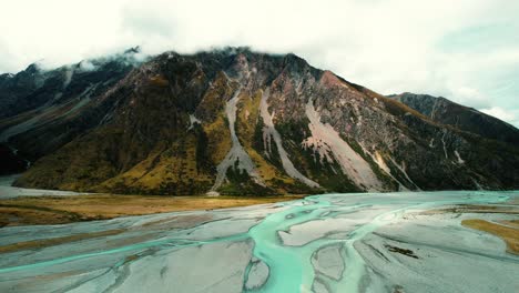 Mount-Cook-National-Park,-New-Zealand-Light-Blue-Streams-with-Mountains