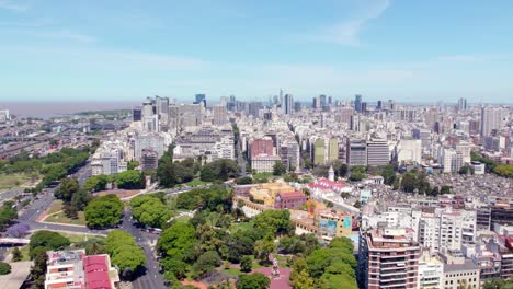 Dolly-in-aerial-view-of-the-Recoleta-neighborhood,-residential-buildings-in-an-upscale-area-of-Buenos-Aires-on-a-sunny-day