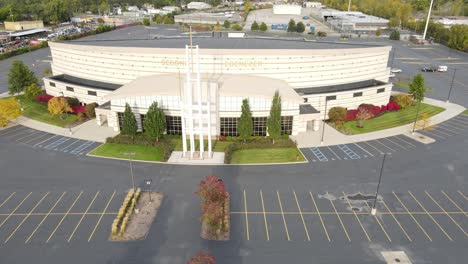 Modern-Church-building-in-vast-parking-lot,-USA,-Detroit,-aerial-view