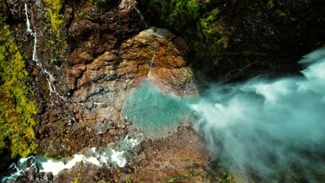 New-Zealand-Drone-Aerial-of-Devil’s-Punchbowl-Waterfall,-Filming-Bottom-to-Top