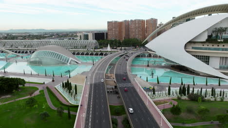 Aerial-View-Of-Roads-And-Modern-Architecture-In-The-City-Of-Arts-And-Sciences-In-Valencia,-Spain---drone-shot
