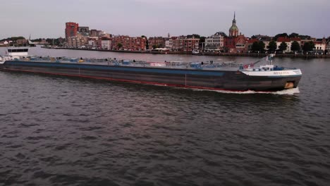 Dordrecht,-Netherlands---04-August-2022:-Minerva-cargo-ship-navigating-the-river-route