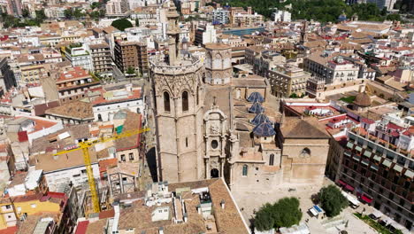 Aerial-View-Of-Cathedral-And-Old-Town-Of-Valencia-In-Spain---drone-shot