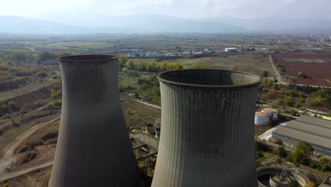 Old-Cooling-Towers-Of-Abandoned-Power-Plant-In-Ptolemaida,-Greece