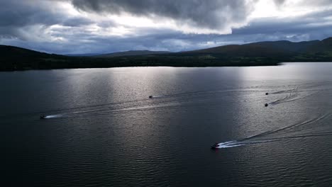 High-Aerial-Angle-of-Boats-Cruising-on-Loch-Lomond,-Scotland