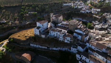 Setenil-de-las-Bodegas---Beautiful-Andalusian-Village-Of-White-Houses-In-Spain---aerial-drone-shot