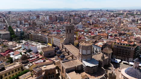 Old-City-Buildings-With-Catholic-Cathedral-In-Valencia,-Spain---aerial-drone-shot