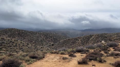 Slow-pan-over-the-desertous-mountains-and-foliage-deep-in-the-Hesperia-Desert,-California-near-Deep-Creek-and-the-Pacific-Crest-Trail