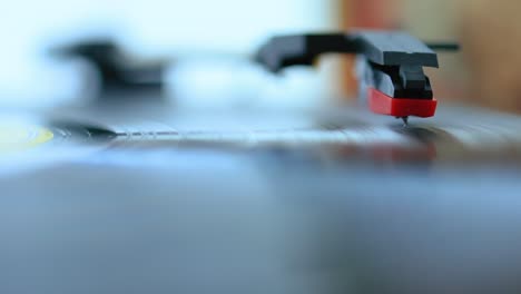 Vinyl-disc-spinning-on-old-record-player-close-up