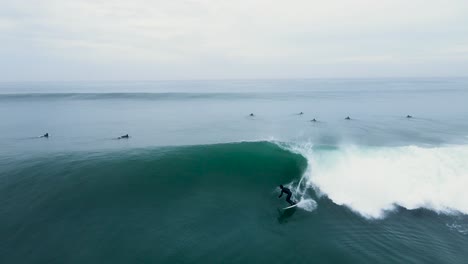 Drone-view-of-a-surfer-on-a-clean-wave-in-carlsbad