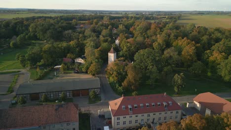 Wonderful-aerial-view-flight-speed-ramp-Hyperlapse-motionlapse-timelapse-of
Village-Church-Paretz-Brandenburg-Havelland-Germany-summer-evening-2022
