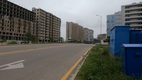 View-Along-Empty-Highway-Road-Beside-Developments-At-Bahria-Housing-Development-In-Karachi
