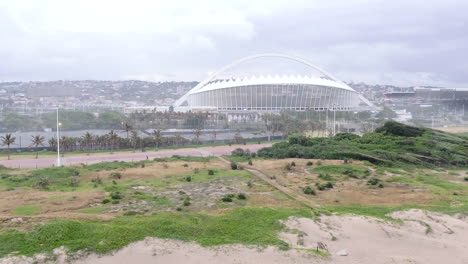 Aerial-drone-revealing-Moses-Mabhida-stadium-in-South-Africa