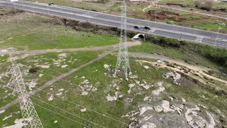 Aerial-overview-of-transmission-towers:-High-Voltage-power-lines-and-Infrastructure