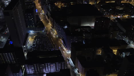 Aerial-drone-through-Durban-city-centre-at-night
