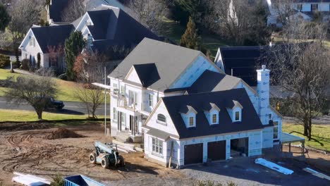 Long-aerial-zoom-of-mansion-under-construction