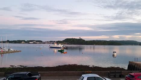 The-Strangford-Car-Ferry-in-mid-Strangford-Lough-heading-for-Portaferry-Co-Down-Northern-Ireland-Ireland-as-the-sun-sets