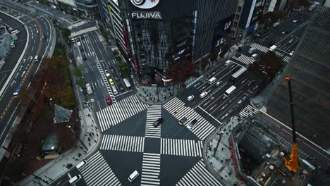 Aerial-view-of-a-busy-intersection-in-Tokyo,-Japan-Ginza-is-a-popular-upscale-shopping-area-of-Tokyo