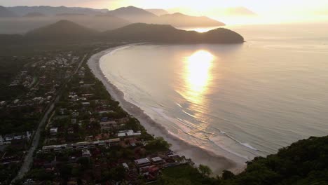 Aerial-overview-of-the-Praia-da-Baleia-beach,-sunset-in-Sao-Sebastiao,-Brazil