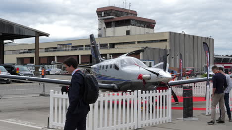 Private-turboprop-aircraft-Daher-TBM-960-and-potential-buyers-at-air-show
