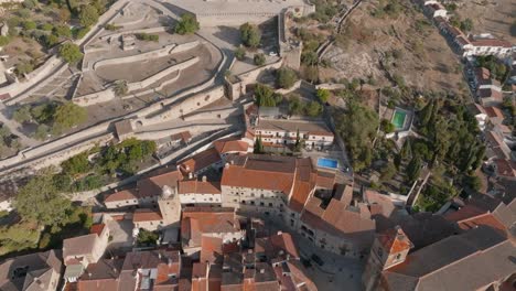 Orbiting-overhead-aerial-view-of-historic-medieval-village-of-Trujillo,-Extremadura,-Spain
