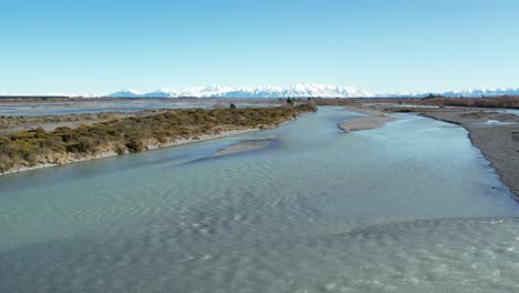 Flying-low-across-beautiful-Rakaia-River-to-show-interesting-patterns-from-side-channels