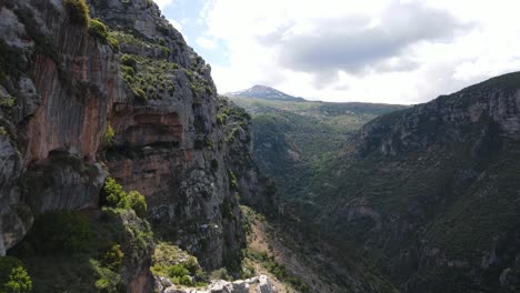Aerial-View-of-Canyon-and-Steep-Cliffs-in-Qadisha-Valley,-Lebanon-on-Summer-Day