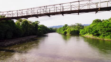 Small-bridge-walkway-over-Calovebora-River,-Panama