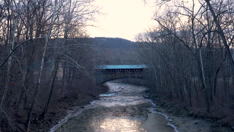 Historic-covered-wooden-bridge-on-a-winter-morning