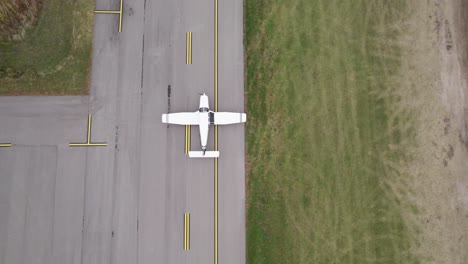Aerial-view-of-the-airplane-on-take-off-or-landing-approach-at-the-airport-runway