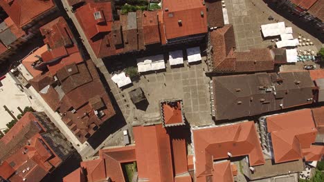 Top-View-of-Oliveira-portuguese-collegiate-church-in-Guimaraes,-Portugal