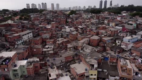 Aerial-view-over-ramshackle-houses-and-streets,-poverty-in-Sao-Paulo,-Brazil