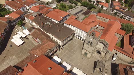 Aerial-View-of-Oliveira-and-Santiago-Square-in-Guimarães,-Portugal