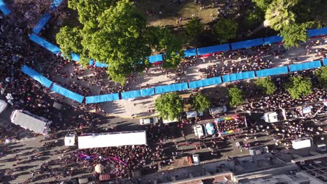 Drone-straight-down-shot-of-many-human-on-street-marching-for-human-rights-on-earth---LGBT-Pride-Parade-in-Buenos-Aires-in-Plaza-de-Mayo-during-sunny-day