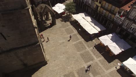 Drone-Footage-Oliveira-square-landmark-with-Church,-Guimaraes