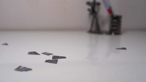 atm-card-pieces-are-falling-down-closeup-view