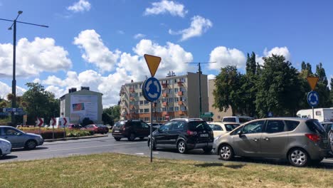 Traffic-jam-with-a-lot-of-standing-vehicles-at-roundabout-in-Mysliwska-and-Koszalinska-streets-in-Kolobrzeg,-Poland