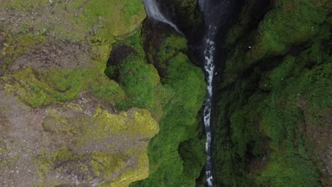 Aerial-downwards-view-of-Glymur-Waterfall-in-Canyon,-Iceland