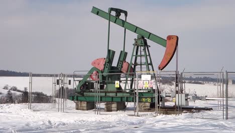 Oil-rig-in-Southern-Moravia,-Czech-Republic-of-MND-company-at-freezing-winter